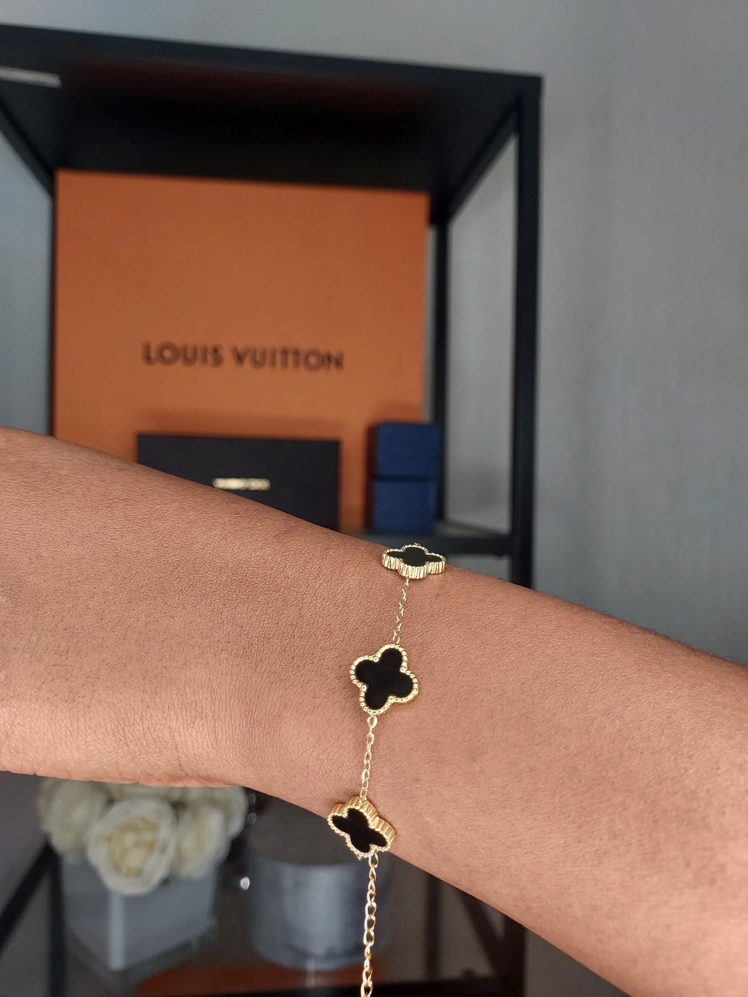 Louis Vuitton four leaf clover bracelet gold and black